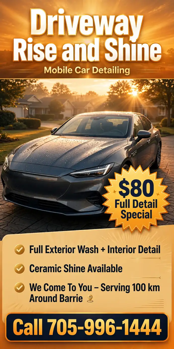 Freshly washed blue car gleaming in a driveway beside organized mobile detailing equipment